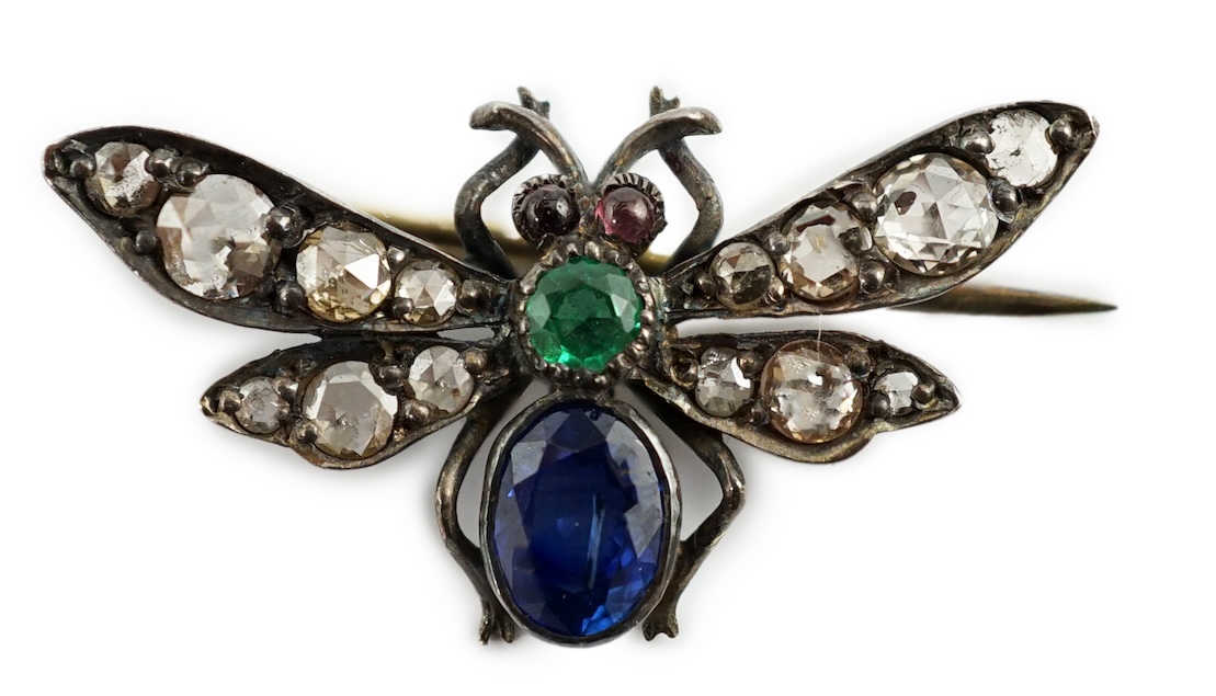 A Victorian gold and silver, emerald, diamond and sapphire cluster set bug brooch